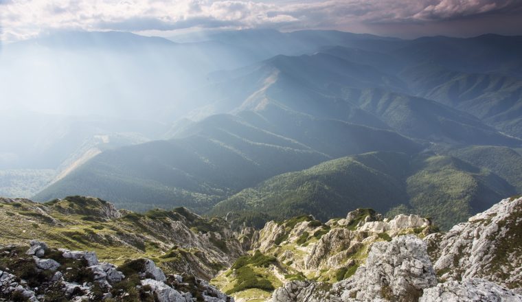 Spring landscape and Piatra Craiului mountains in background,Tra